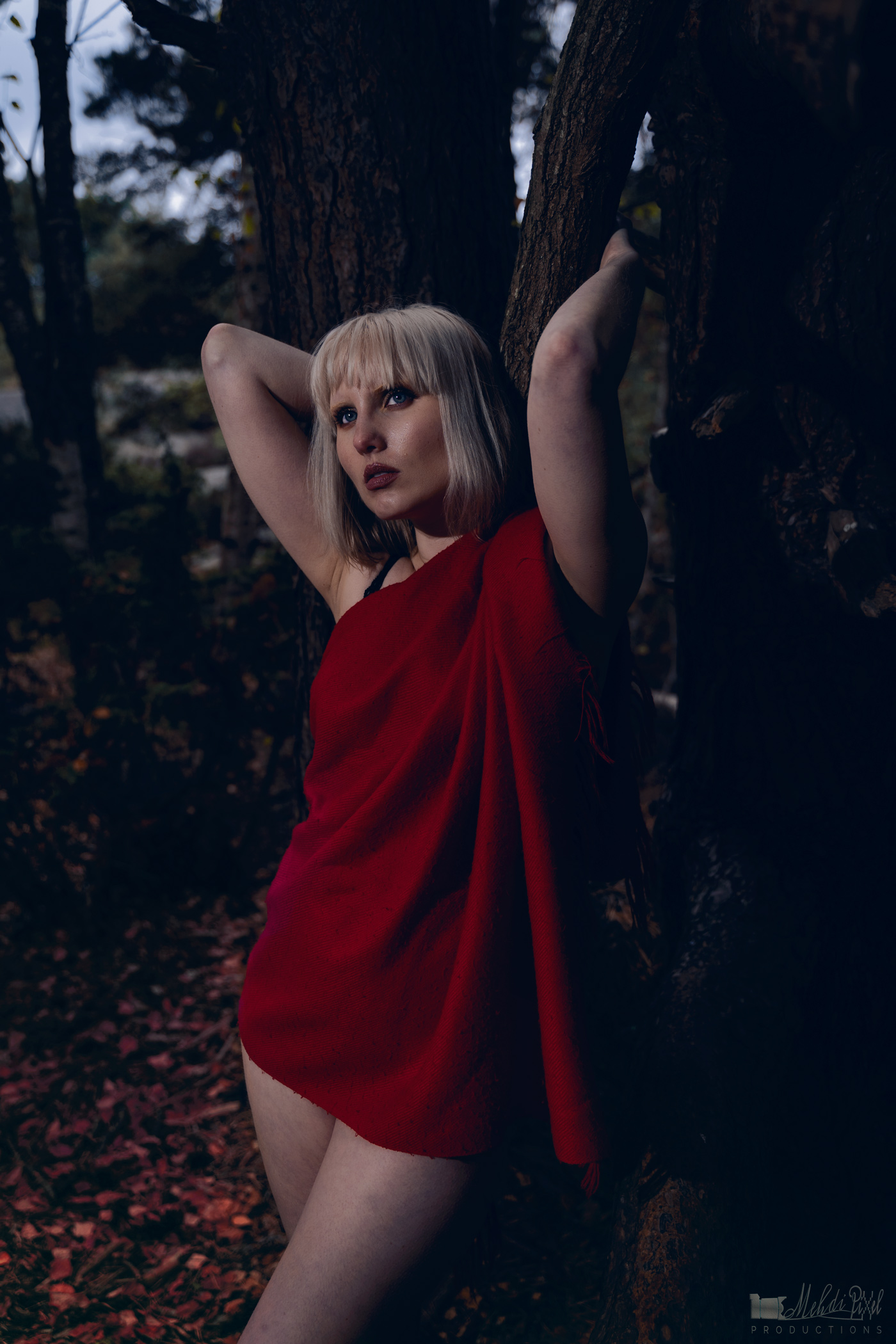 Girl in red in forest