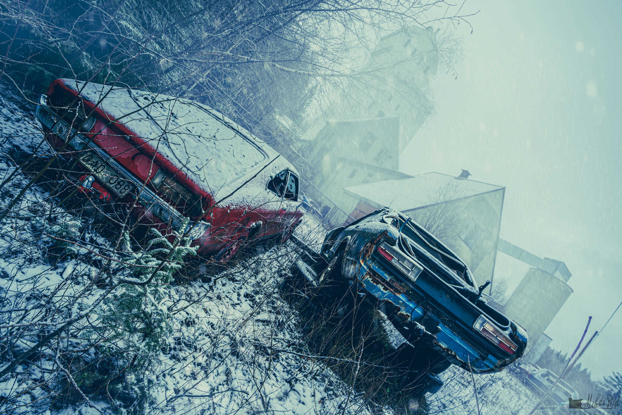 Two old abandoned classic cars facing an abandoned mine in Sweden