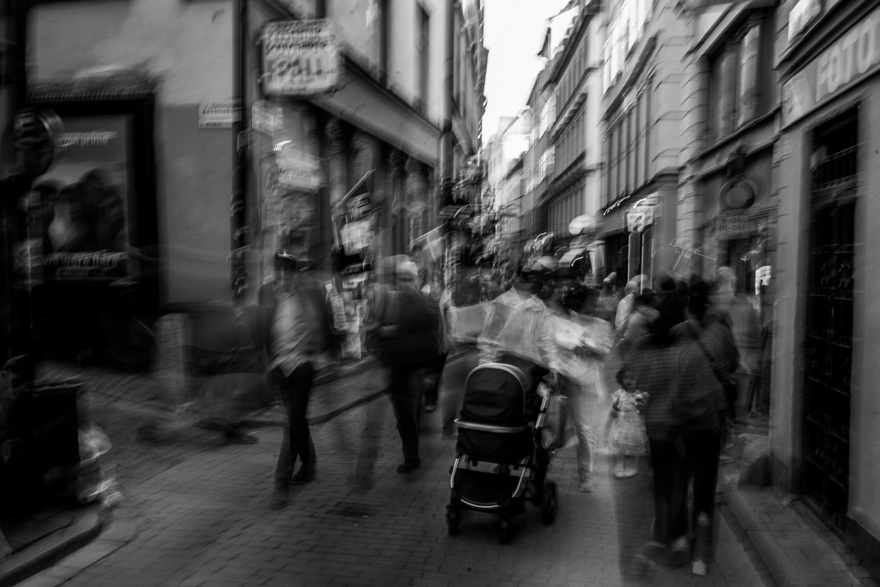 Here in Stockholm’s Gamla stan, the street feels like a tide: waves of people, rushing, blending, dissolving into each other.